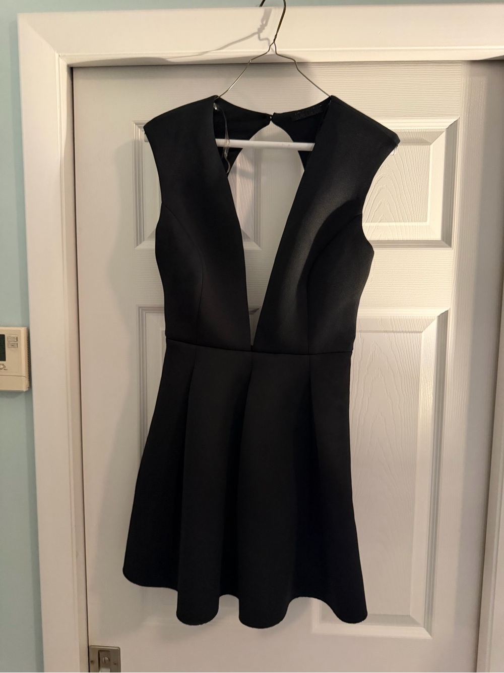 Sleeveless Black Deep-V Mini Dress
